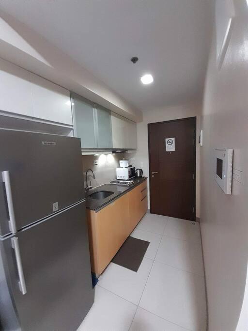 One Uptown Residence Infront Grand Hyatt 1Br, Washer,Fast Wifi Manila Exterior photo